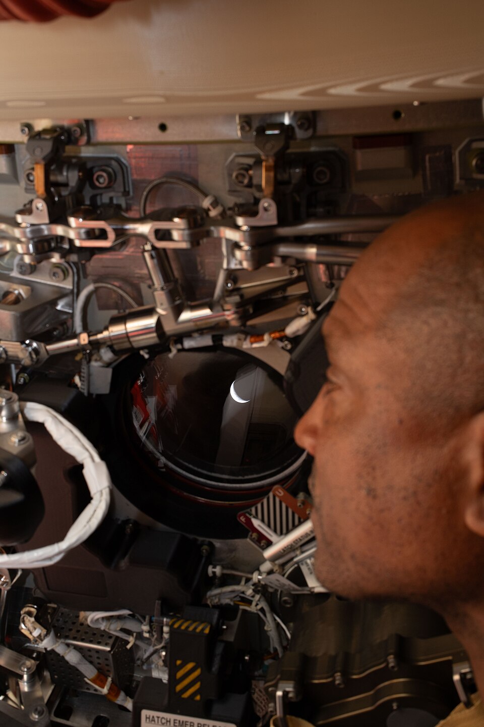 Victor Glover looking at Earth from Orion