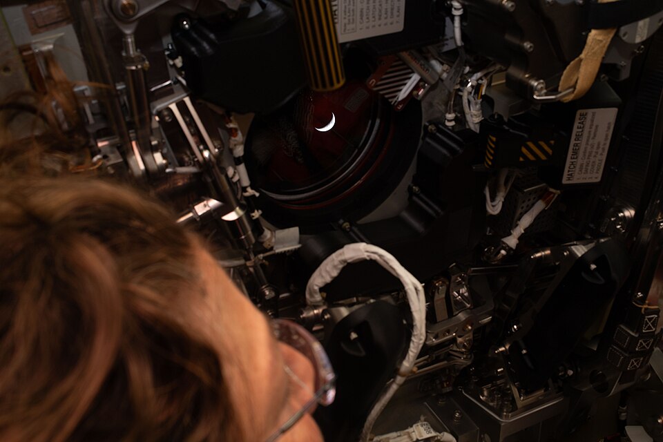 Christina Koch looking at Earth - Home Sweet Home