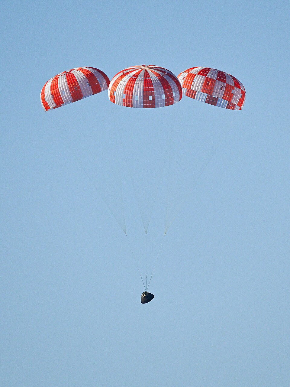 Orion parachutes during Artemis II splashdown